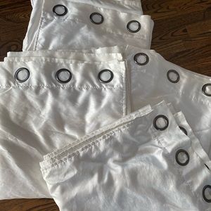 Two pairs of pearl white curtains